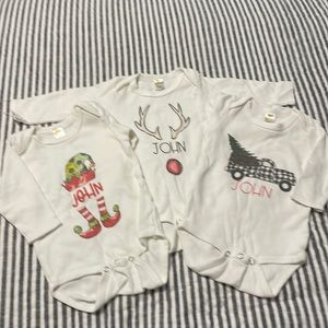 6-12 month long sleeve onesies. Christmas theme. John.